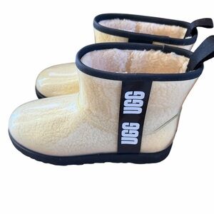 UGG Cream Shearling Boots with Black Trim